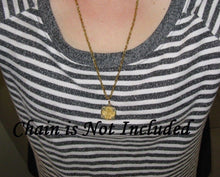 Load image into Gallery viewer, Solid 24k Gold Escudo Reproduction in Custom 14k Genuine Emerald Set Bezel Ladies High End Nautical Shipwreck Pendant