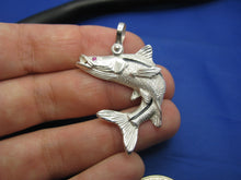 Load image into Gallery viewer, Sterling Silver Curved Snook Pendant with Genuine Ruby Gemstone Eye and Shackle Bail