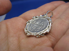 Load image into Gallery viewer, Sterling Silver Graveyard Skeleton Bone Wrapped Bezel with Reproduction "1 Reale" Pirate Treasure Coin Cob Necklace (Shipwreck Jewelry)