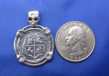 Load image into Gallery viewer, Sterling Silver Pirate Coin Pendant with Reproduction "1 Reale" Treasure Cob with Red Crysta Skull Bail and Bone Prongs