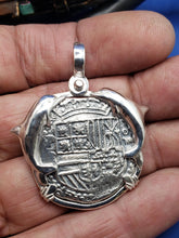 Load image into Gallery viewer, Large Sterling Silver Dolphins Bezel With Reproduction Coin of Spanish King Shield Recovered &#39;4 Reale&#39; Shipwreck Cob Artifact  Pendant
